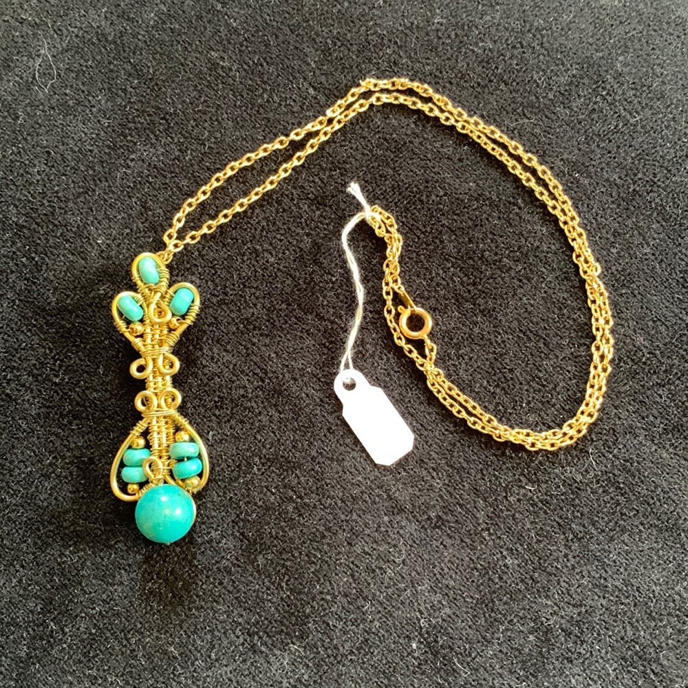 Turquoise and gold tone wire wrapped necklace